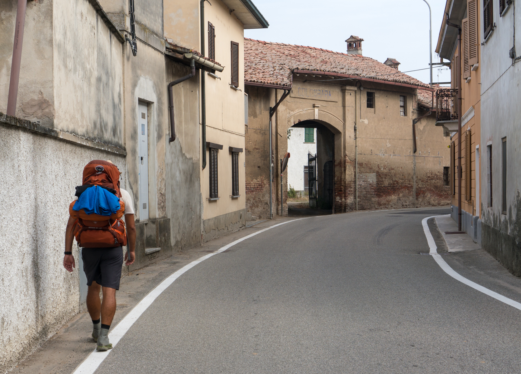 A pilgrim on the Via Francigena in Villanova d'Ardenghi, Italy | Photo by Mike Hudak