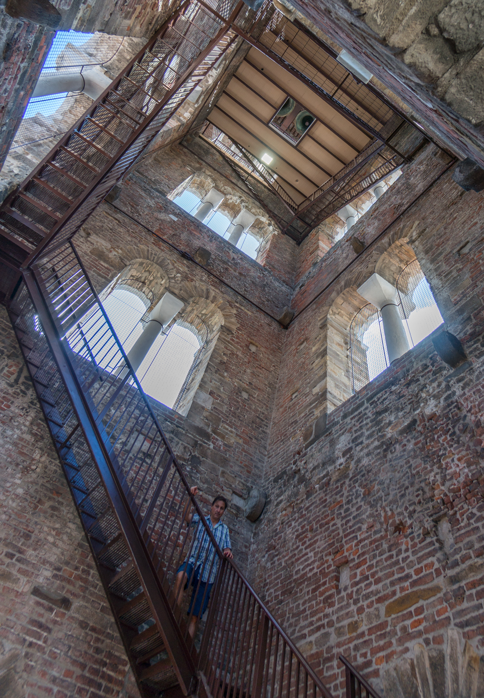 Heavenward view within the 12th-century bell-tower of Lucca's Duomo di San Martino, Italy | Photo by Mike Hudak